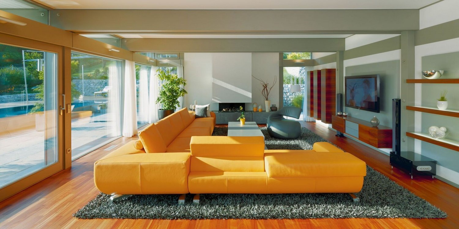 HUF Haus Art 5 grau Pool 21 Stilvolles Wohnzimmer mit großen Glasflächen und eleganter Ausstattung