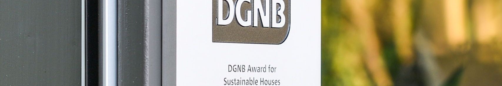 DGNB award plaque on HUF Haus for sustainability excellence