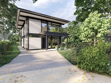 Moderne Architektur eines Mehrfamilienhauses umgeben von Natur